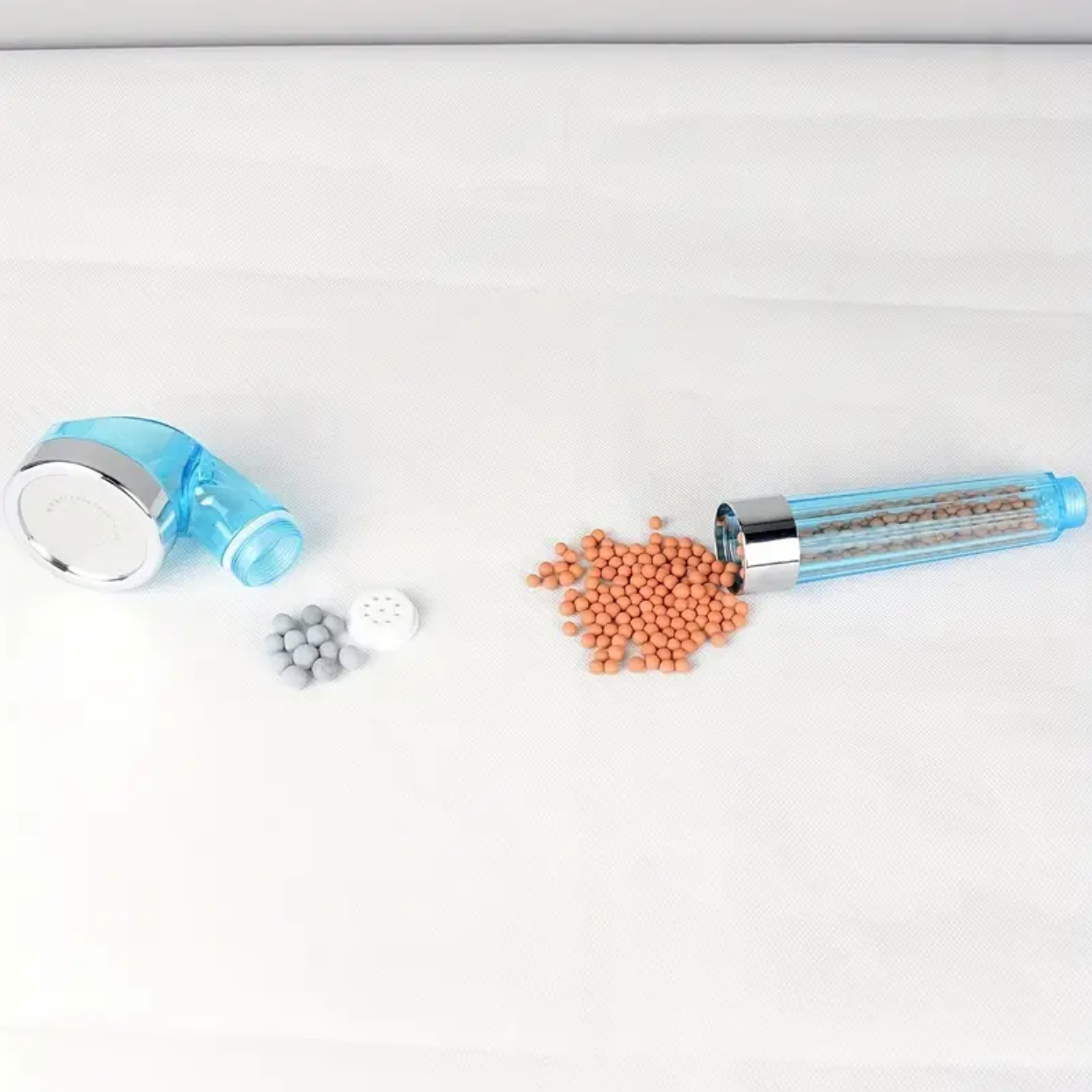 Neutralizing shower head for revitalized skin